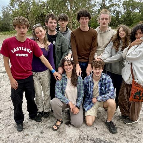 Group of campers standing smiling at the camera